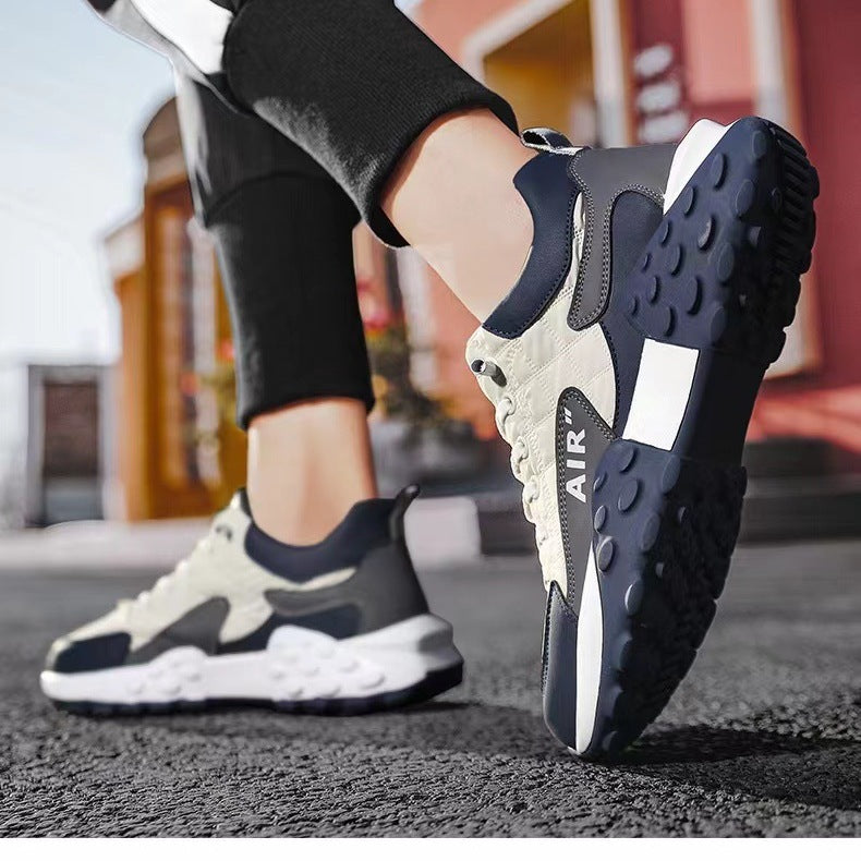 Beige AeroStride shoes worn in the city