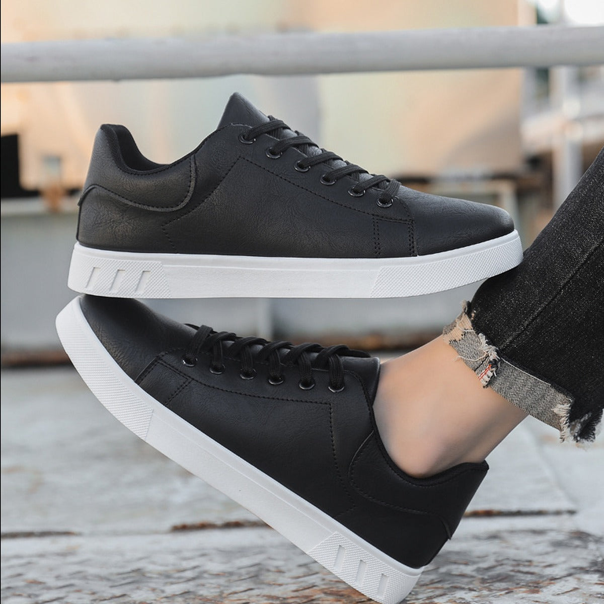 Harlan men's smart casual trainers in black, worn