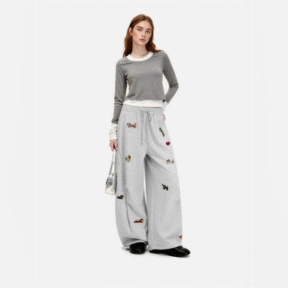 Amalia embroidered pup barrel sweatpants in grey, worn