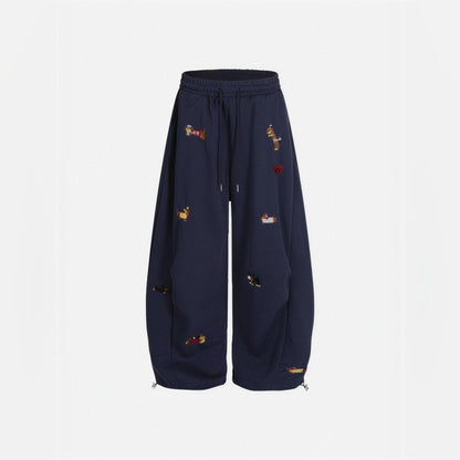 Amalia embroidered pup barrel sweatpants in navy blue, flat front