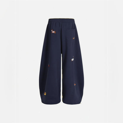 Amalia embroidered pup barrel sweatpants in navy blue, flat back