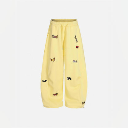 Amalia embroidered pup barrel sweatpants in yellow, flat front