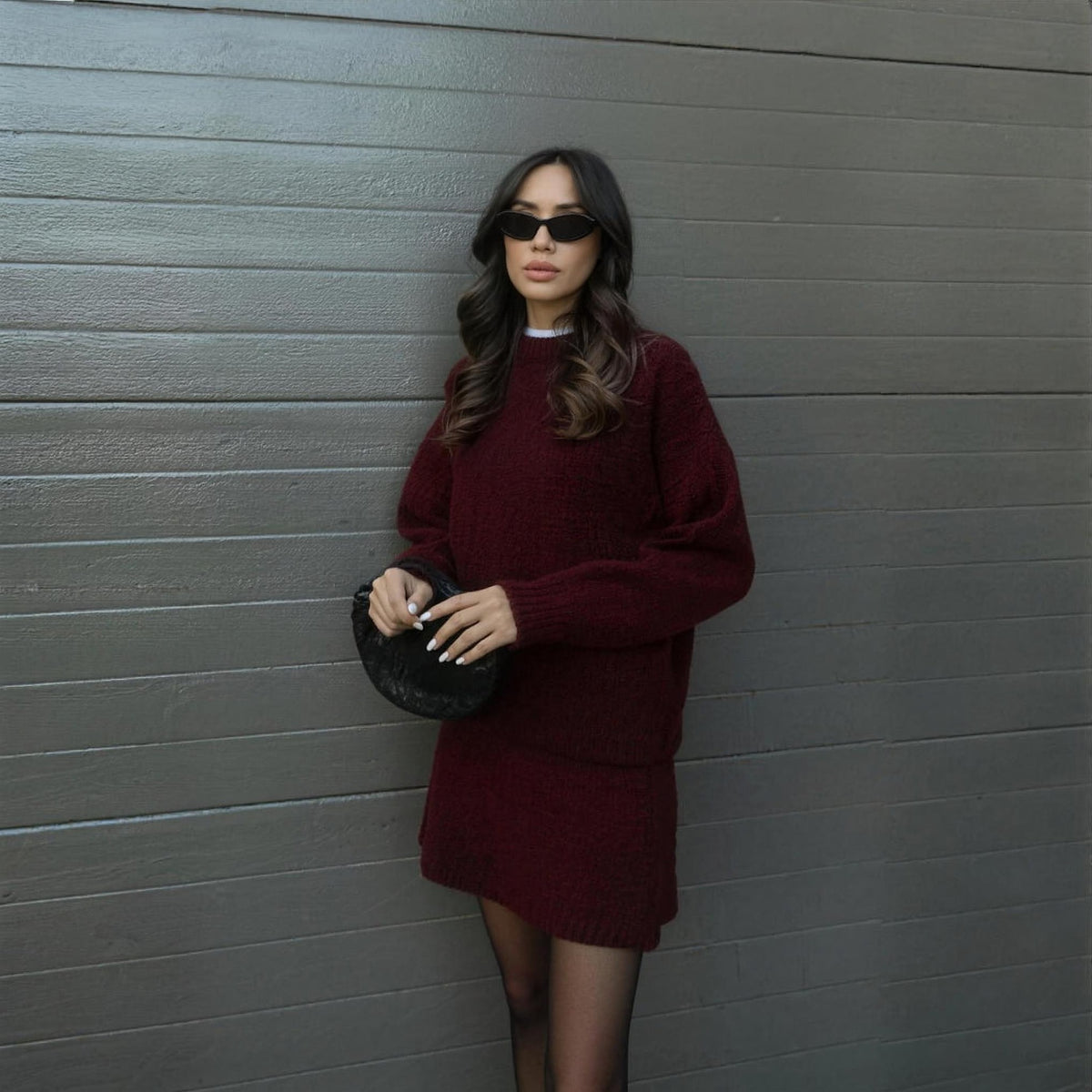 Beatrix burgundy knit co-ord set styled with a black bag