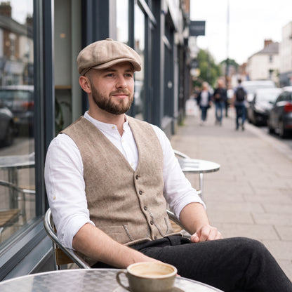 Birmingham snap brim cap in sand beige with a tweed waistcoat and grandad shirt