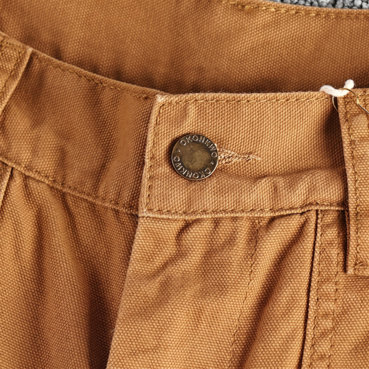 Brennan Trousers waistband button detail