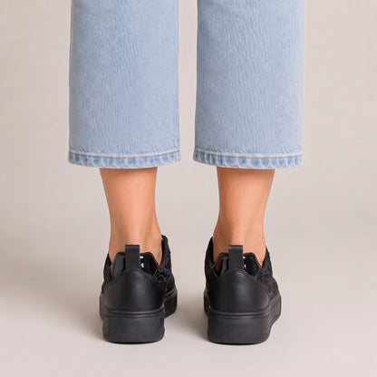 Clara floral lace trainers in black, back view