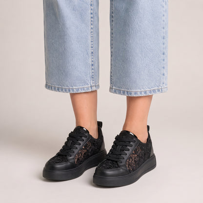 Clara floral lace trainers in black, front view