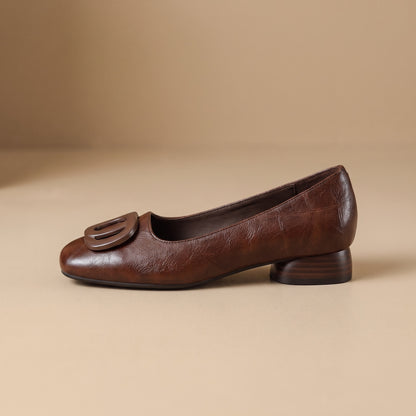 Colette flats in Brown, side profile showing the low block heel