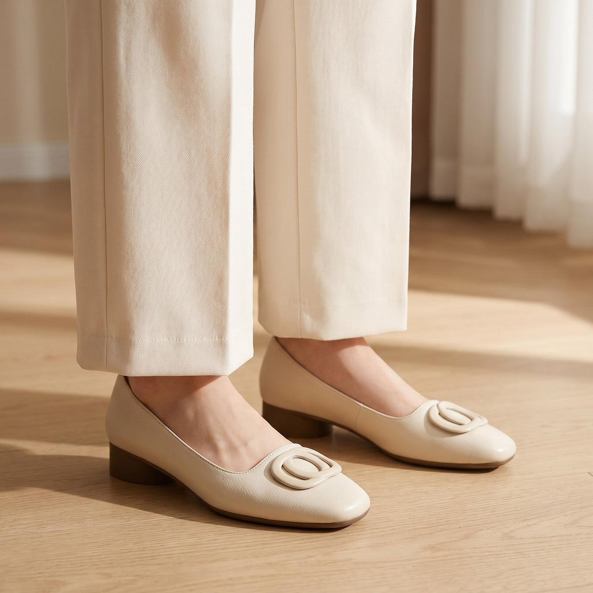 Colette flats in Cream styled with wide-leg trousers