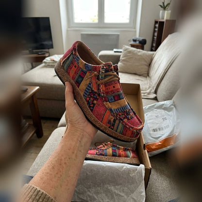 Evrey Boho Comfort Shoes in red held out of the box