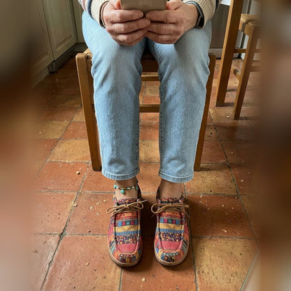 Evrey Boho Comfort Shoes in red worn with light blue jeans