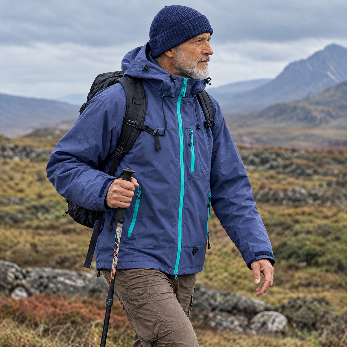Brecon Shell Jacket in Indigo – man hiking in the Highlands