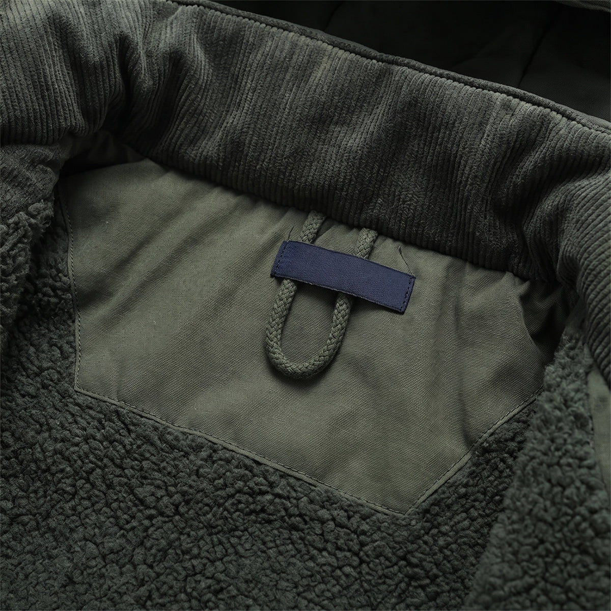 Kingsley parka detail: hanging loop inside the collar