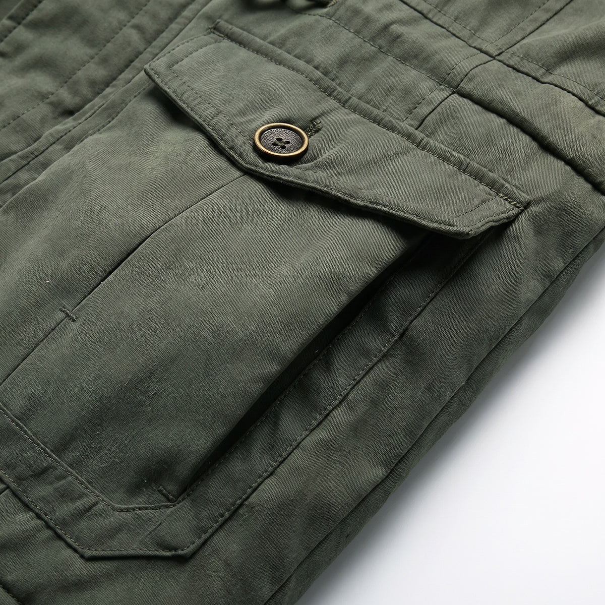 Kingsley parka detail: flap pocket with button