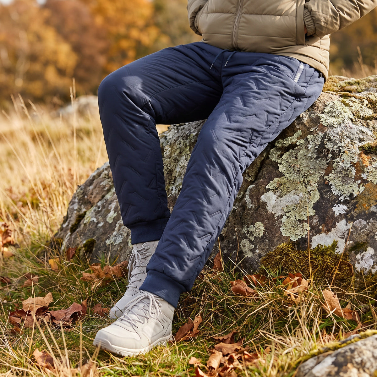 Thermal fleece joggers in navy, resting outdoors