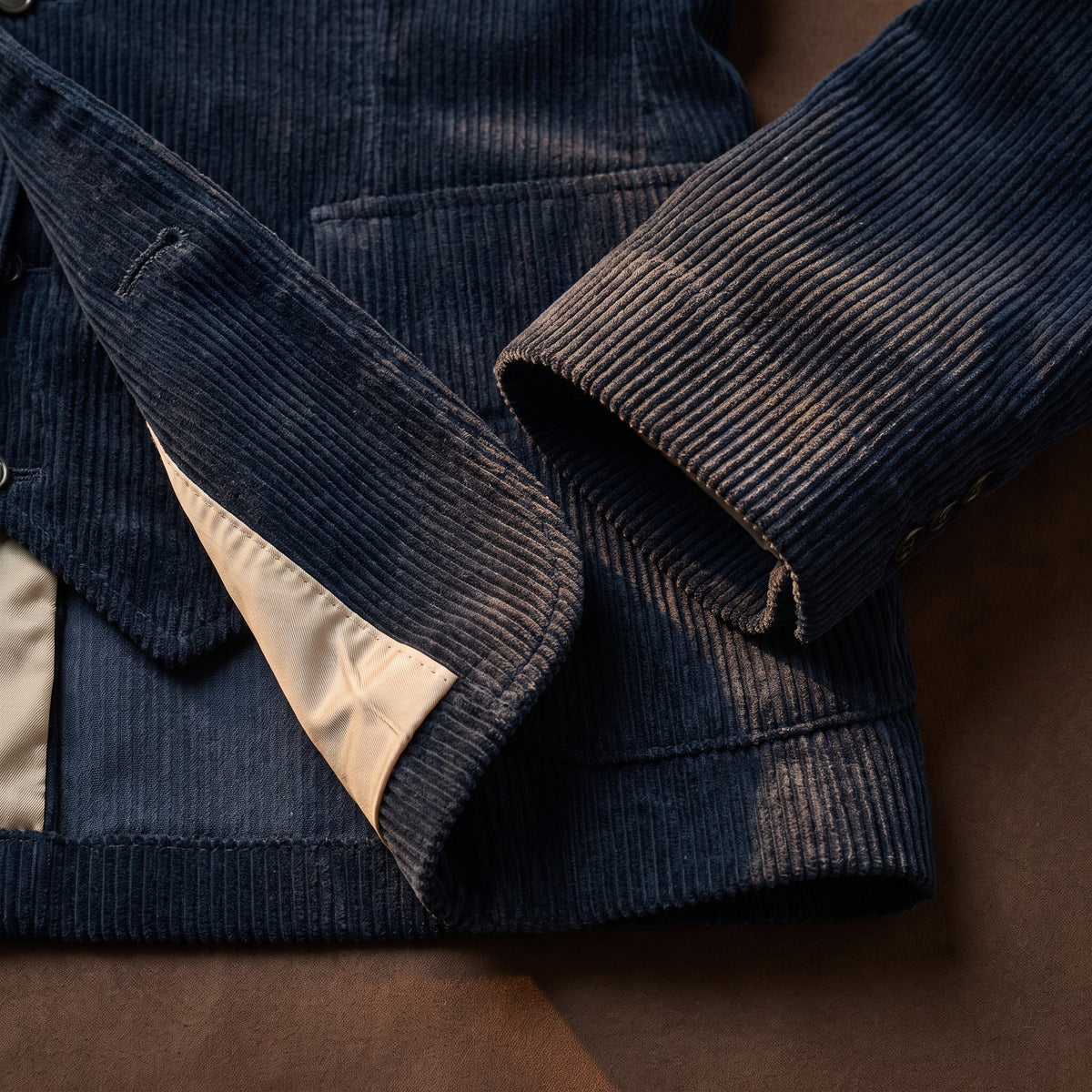 Hem and cuff detail of the blue corduroy blazer