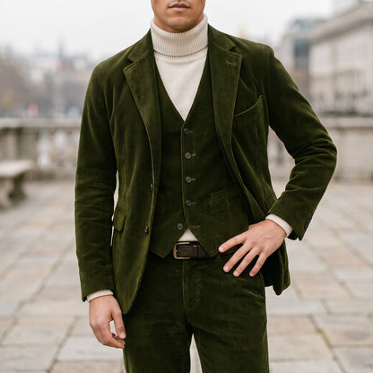 Green corduroy blazer worn over a roll-neck jumper