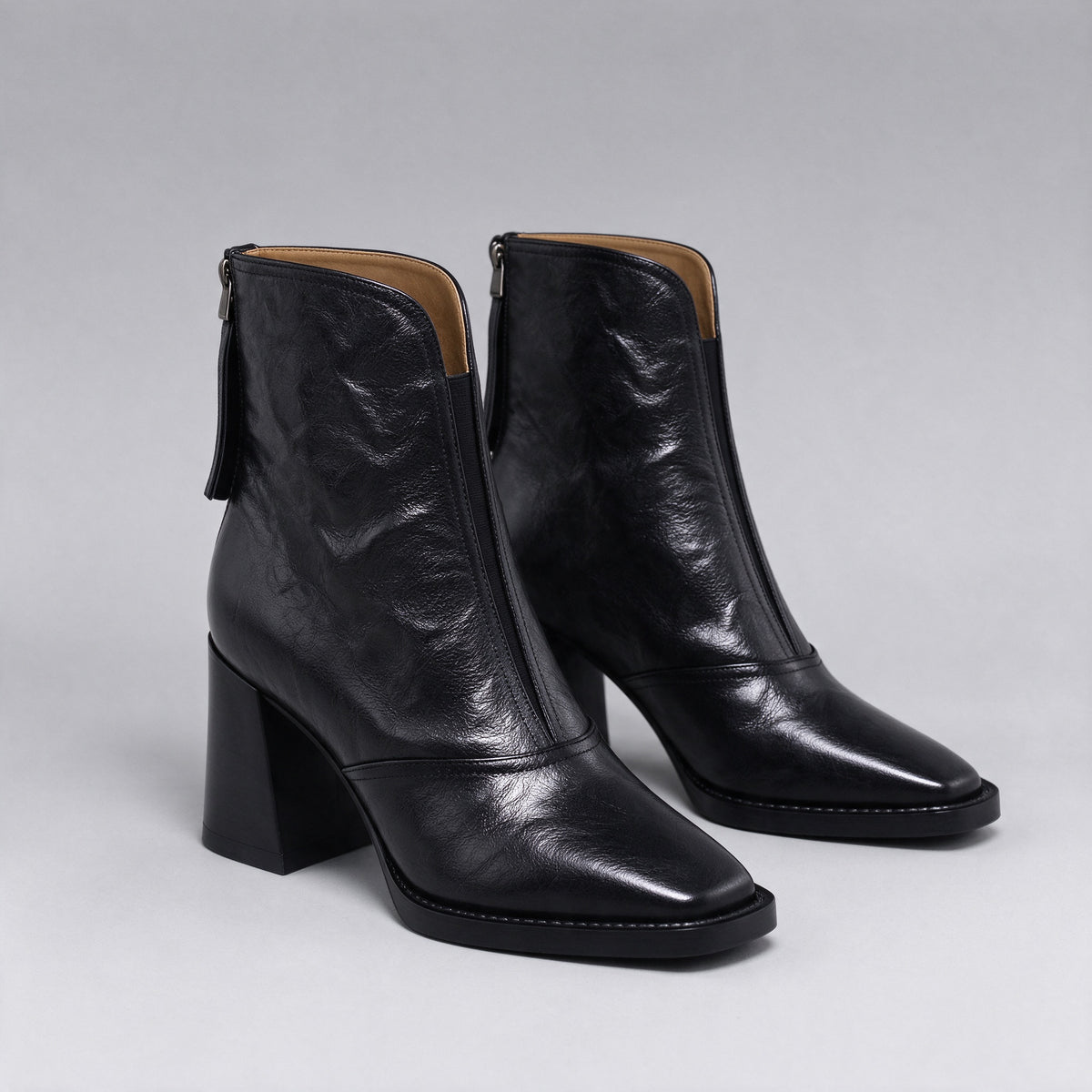 Livia leather mid-heel ankle boots in black, pair