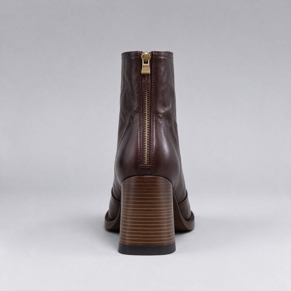 Livia brown ankle boot from behind, back zip and stacked wooden block heel