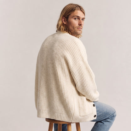 Nolan relaxed V-neck cardigan in apricot, worn