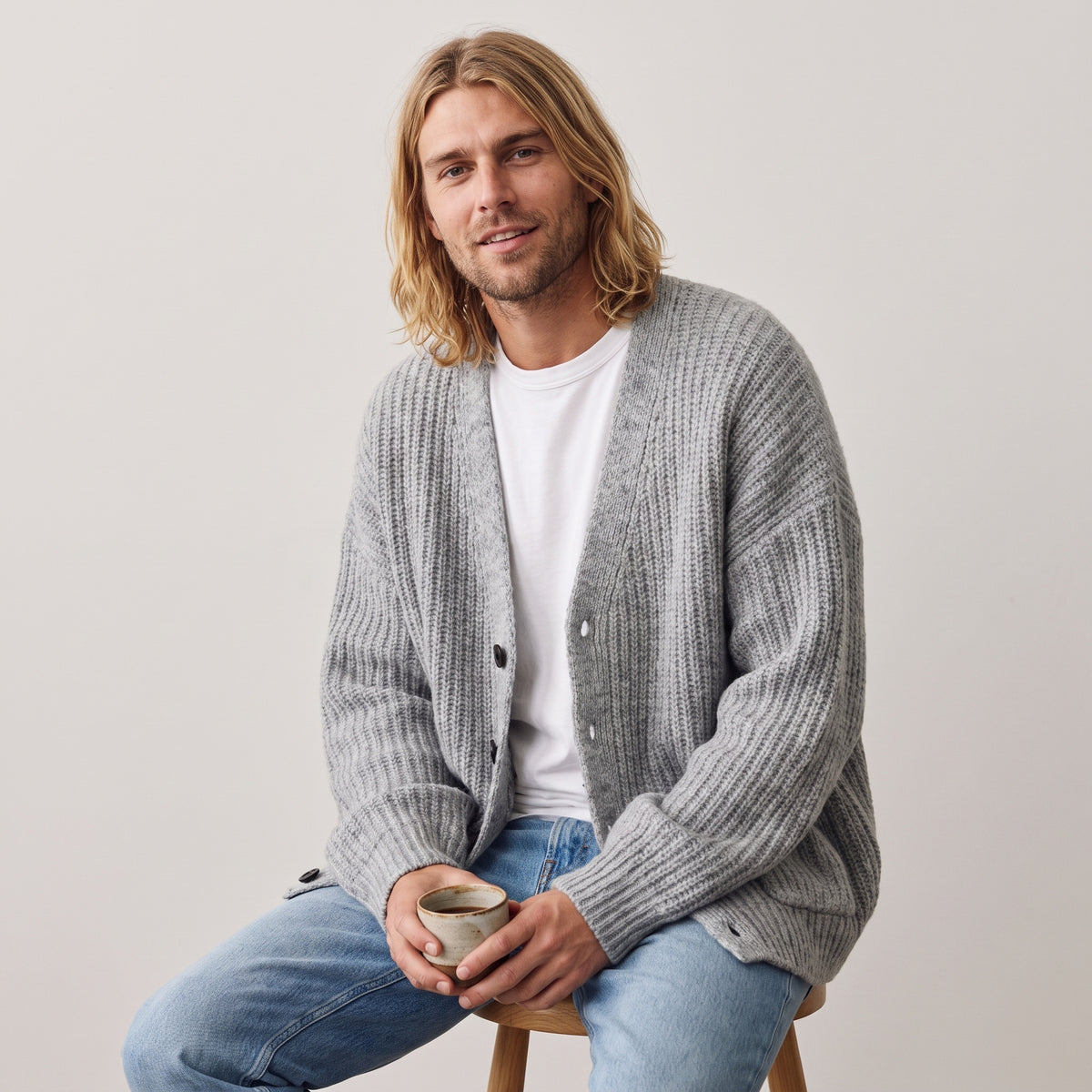Nolan relaxed V-neck cardigan in grey, worn