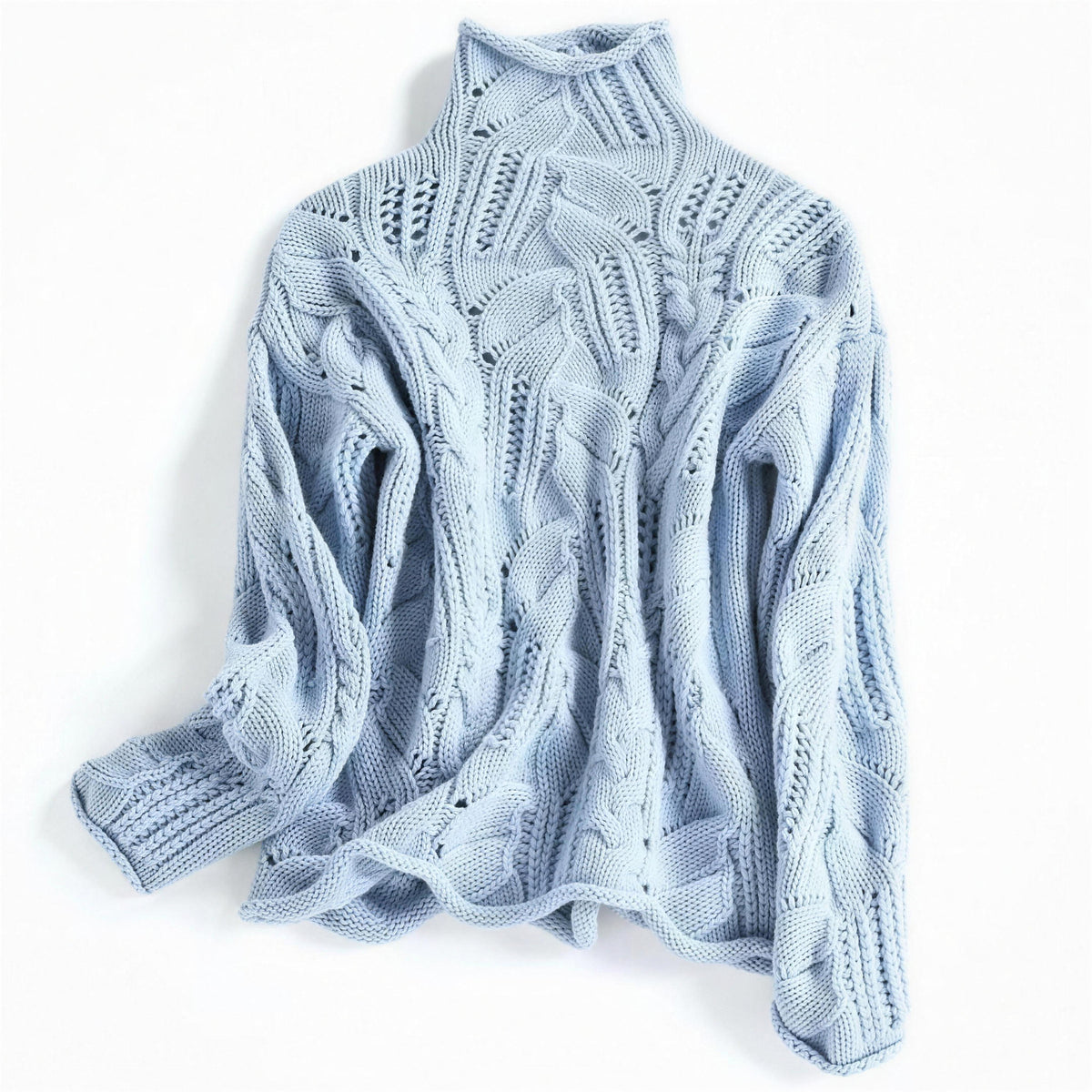 Oriana cable knit sweater in wavy blue, laid flat