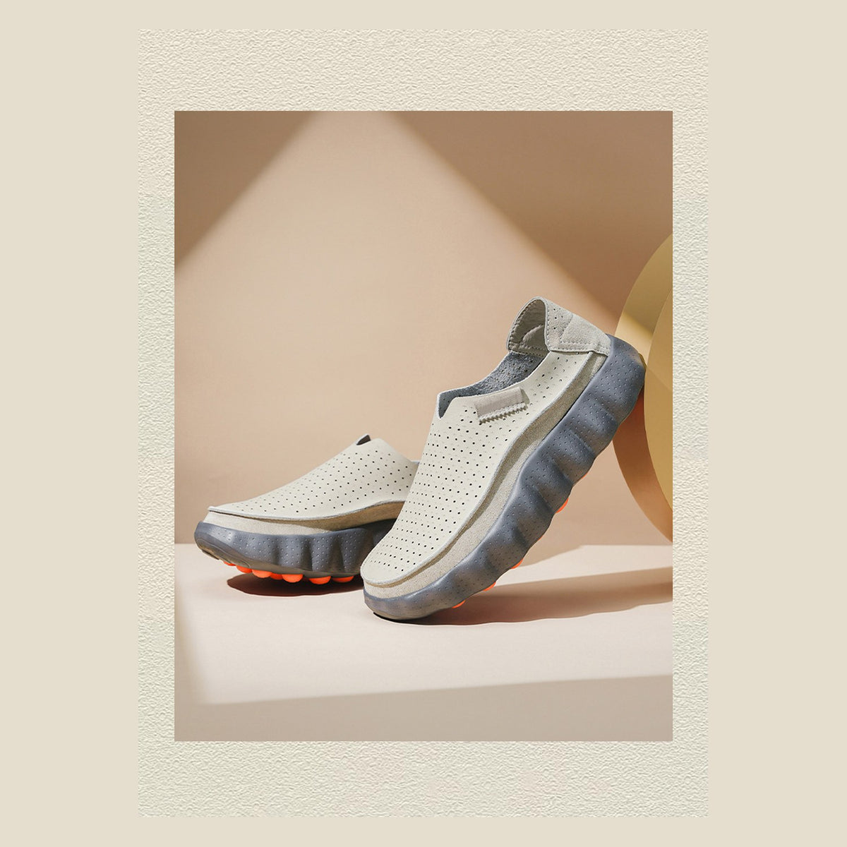 Grey Ryden loafers on a plinth