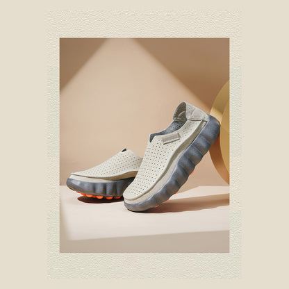 Grey Ryden loafers on a plinth