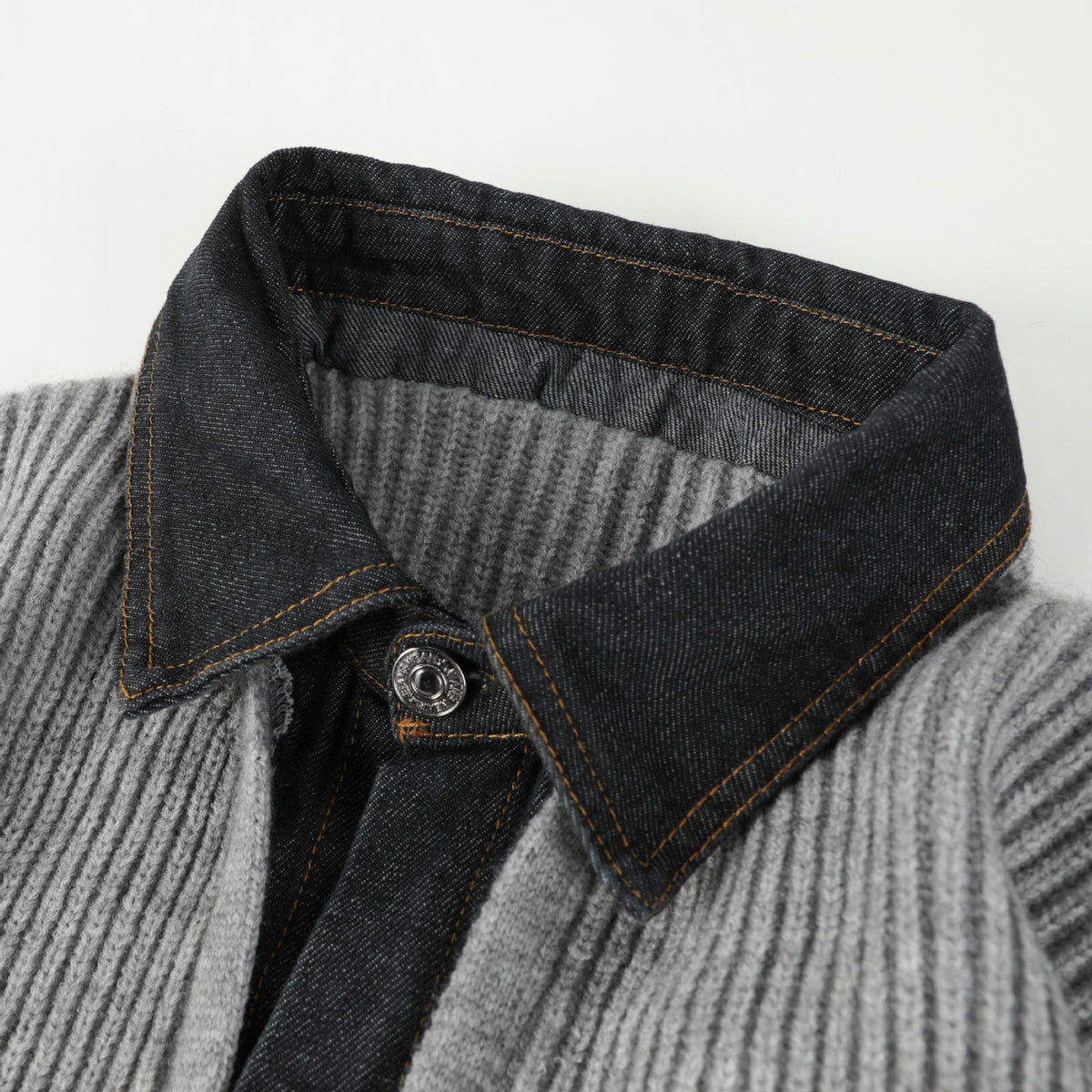 Close-up of the contrast denim collar and topstitching