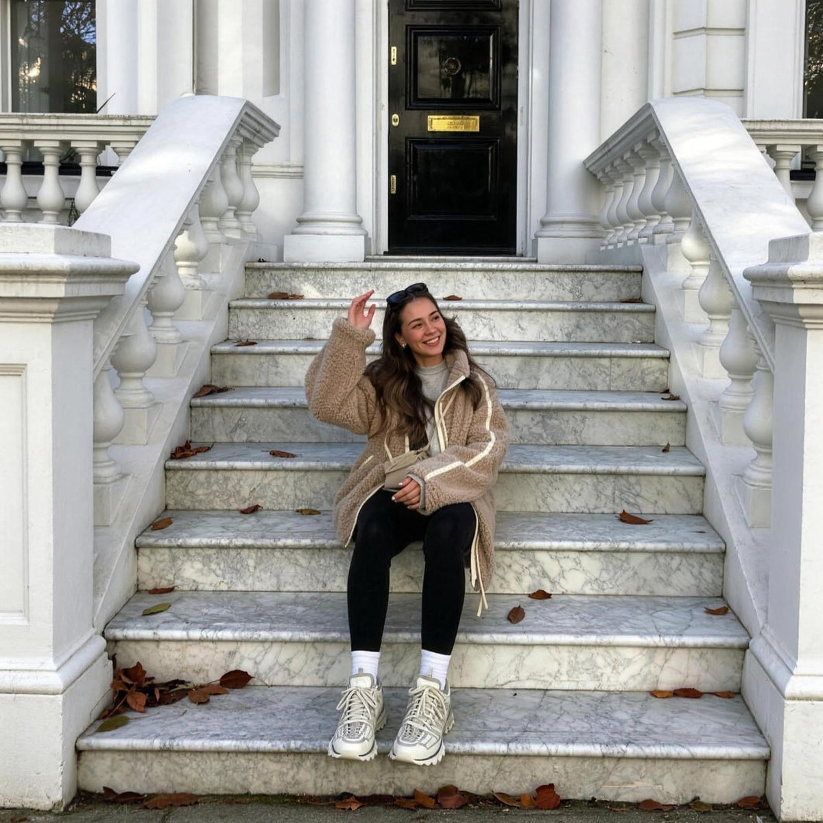 Sylvie Alpaca Oversized Coat in coffee, sitting on steps