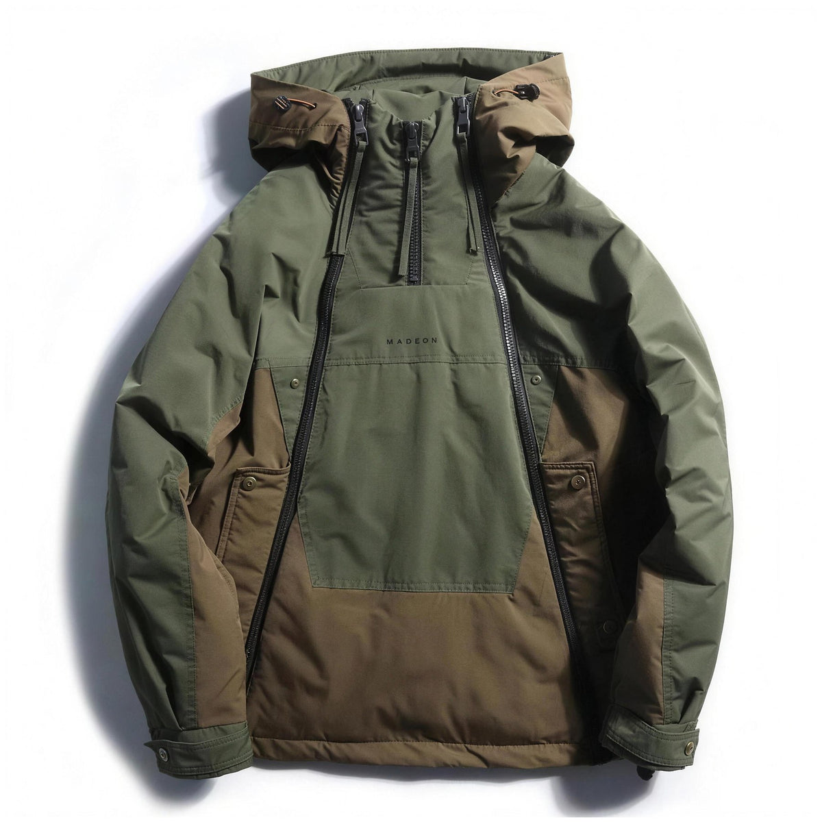Green Rowe anorak, front view with hood up