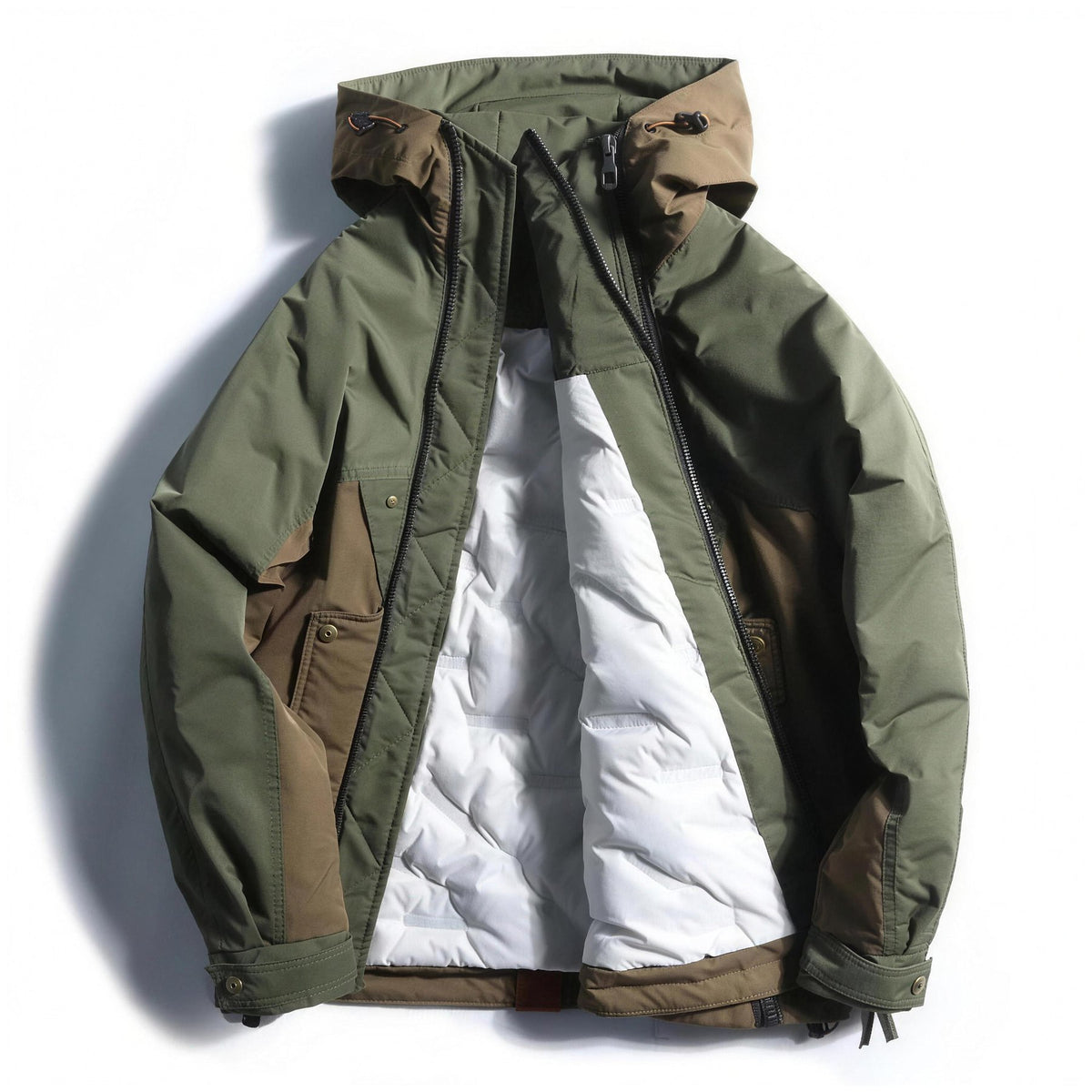 Green Rowe anorak open, showing the quilted lining